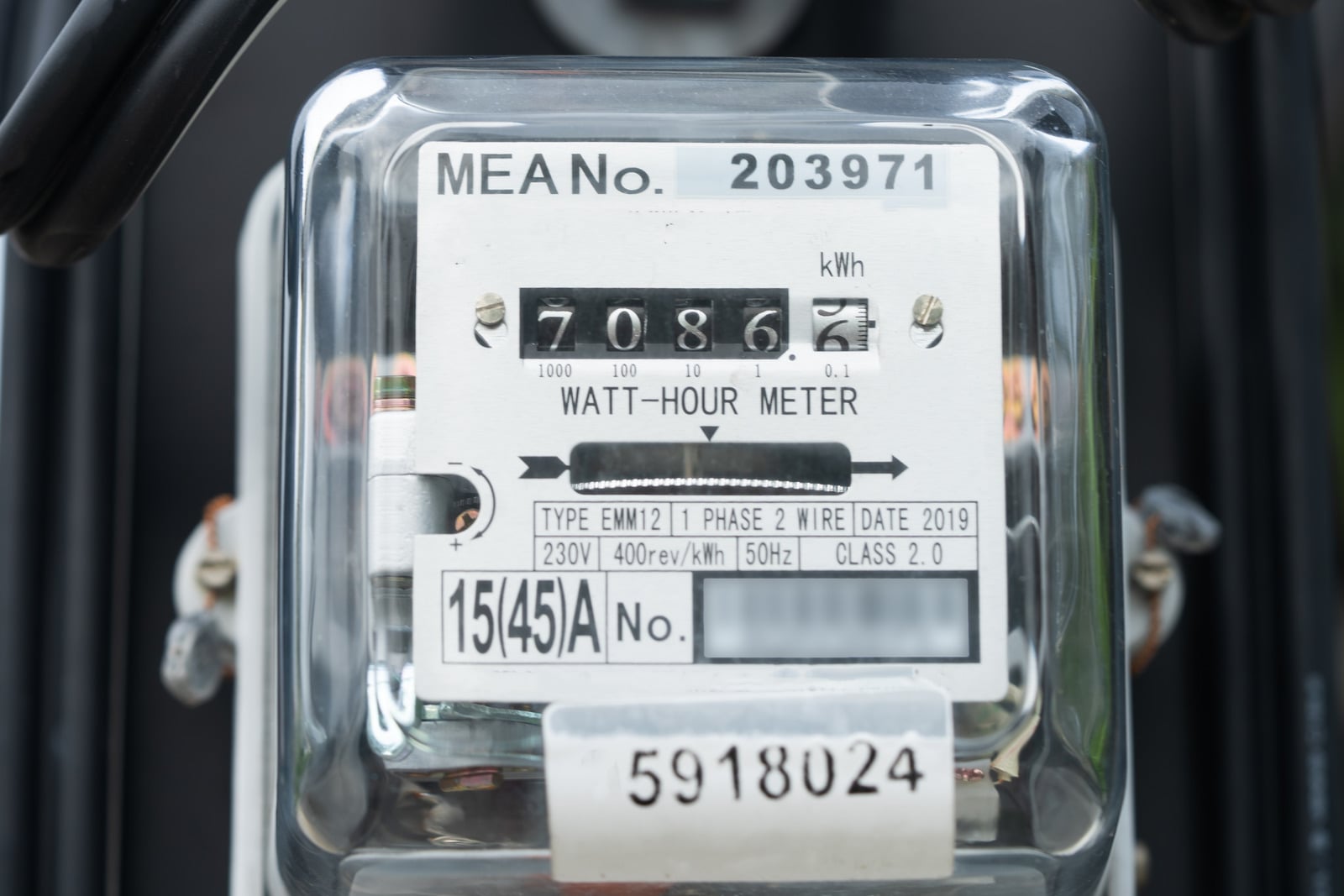 Conventional electricity meter with a mechanical consumption display.